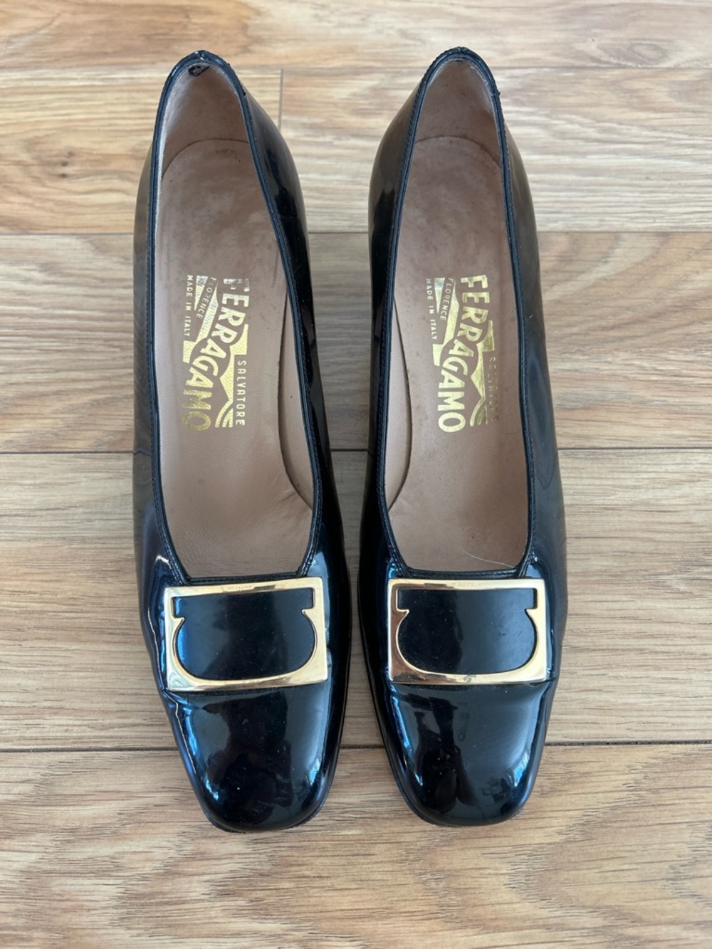 Salvatore Ferragamo Black Patent Leather Pumps with Gold Buckle